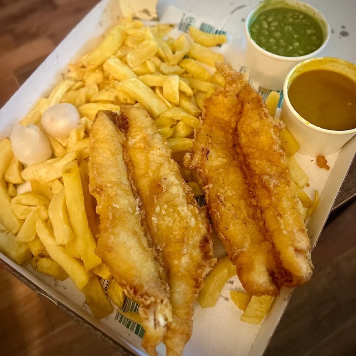 fish and chips with sauce served at Tony's Chip Shop in Coatbridge 